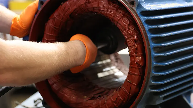 Cleaning out excessive varnish from electirc motor stator.
